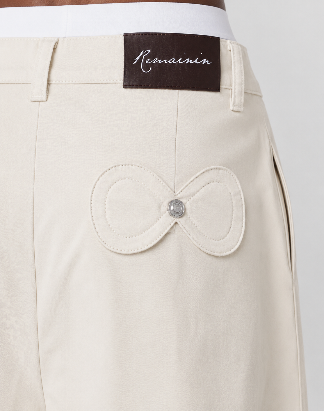 ÉTERNITÉ PLEATED SHORTS